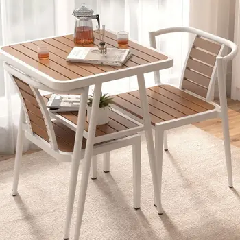 Varanda de lazer layout moradia minimalista de chá ao ar livre cadeira de mesa combinação família unidade pequena mesa de refeições conjunto de móveis